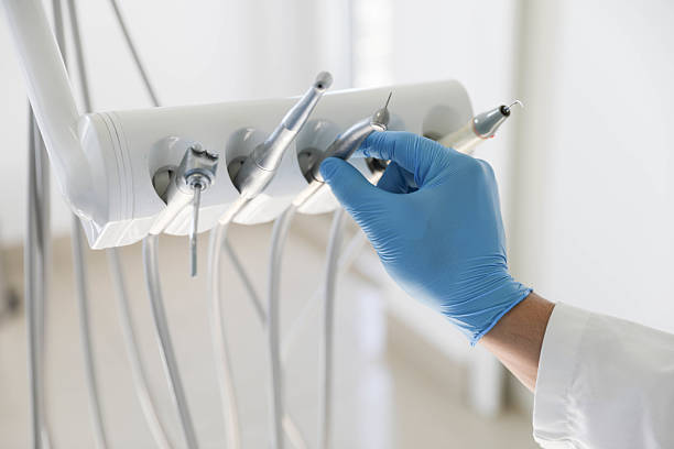 Professional Root Canal Treatment technician working in Midwest City, OK